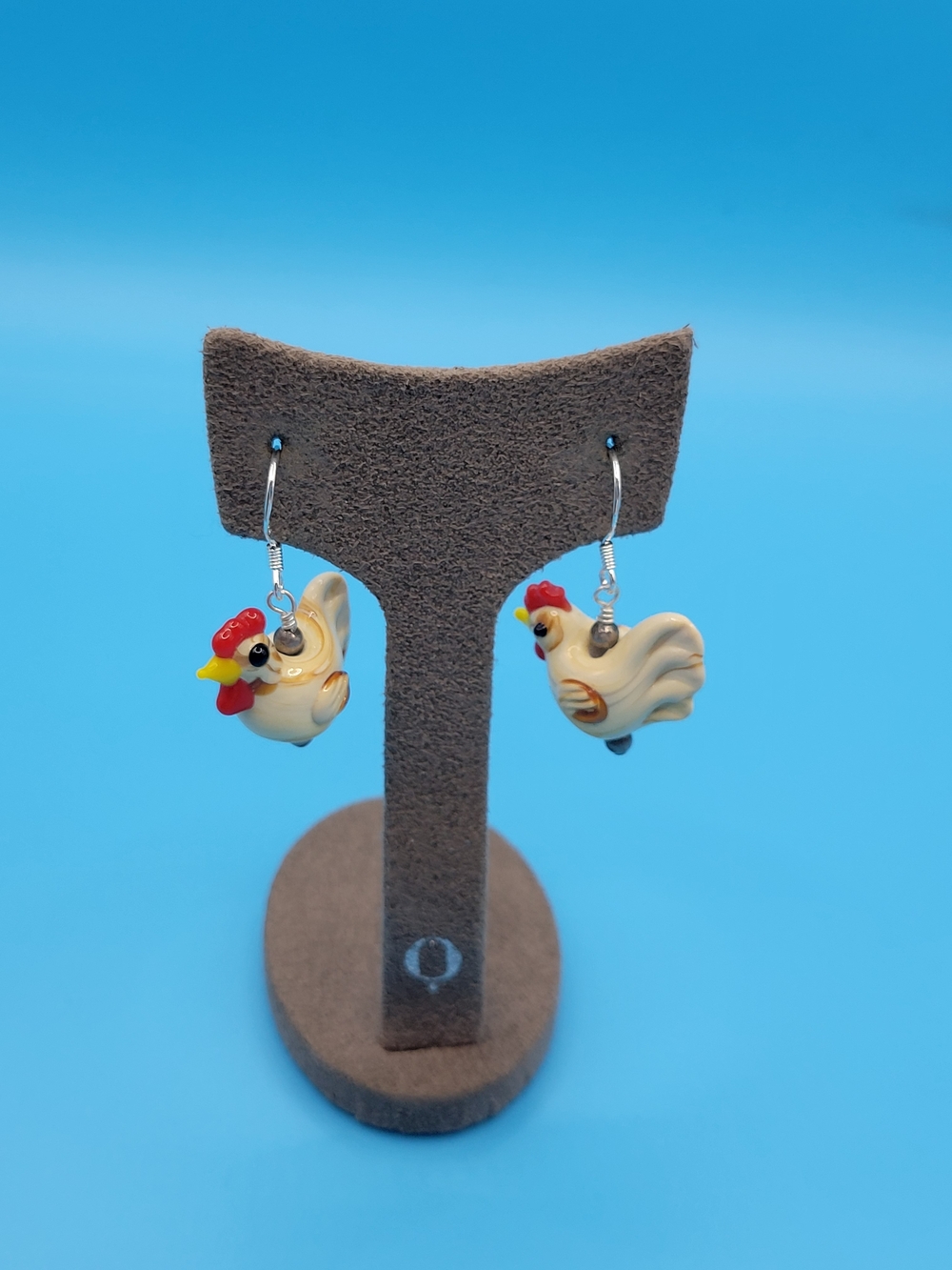 Light tan Lamp work Chicken glass adorned sterling silver earrings